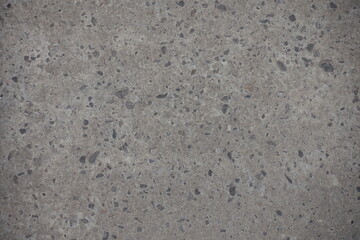 Weathered surface of old gray concrete slab