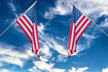American flag against the backdrop of the blue sky
