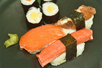 variety Sushi Japanese food with wasabi dipping soy sauce on plate