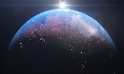 Realistic sunrise over world horizon seen from space. 