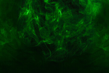 Green steam on a black background.