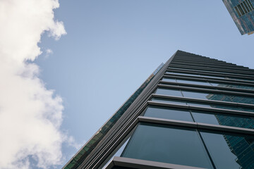Fototapeta na wymiar modern office building with clouds