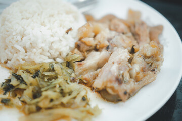 Roasted pork knuckle served on jasmine rice