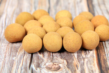 Longan is on the wooden table