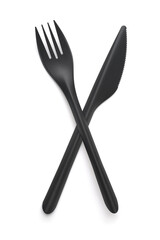 Top view of  black plastic disposable fork and knife