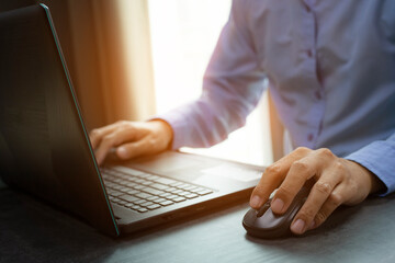 closeup hands of businessman working at office, Man typing keyboard on laptop or computer