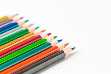 Set of colored pencils on white background. Back to school concept. Place for text.