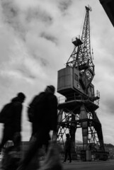 blurred silhouetted figures in Bristol Docks