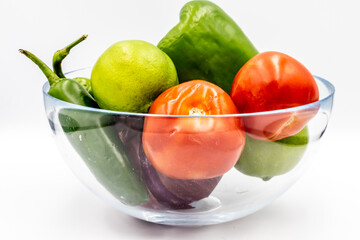 Colourful ingredients for pico de gallo on boards and in bowls. Calgary, alberta, Canada