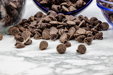 Chocolate chips on a marble slab. Calgary, Alberta, Canada
