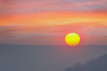 Big sun and Mist in sunrise,Morning,White balance orange on sunrise
