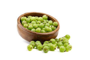 Gooseberry in wooden bowl isolated on white background. Green summer berries