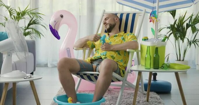 Man cooling himself during a summer heatwave