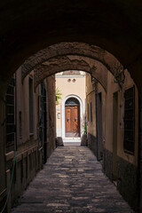 narrow alley in the oldtown of Orbetello
