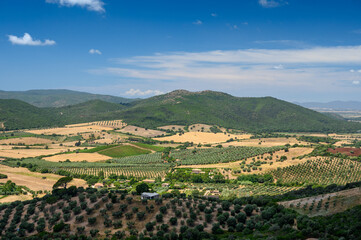 view from the old curtain wall of the picturesque tuscan village of Capalbio - obrazy, fototapety, plakaty