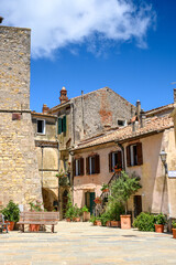 Fototapeta na wymiar beautiful medieval house in picturesque tuscan village of Capalbio