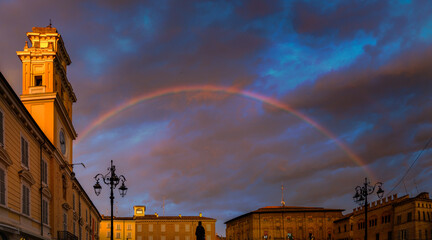 Fototapeta na wymiar Palazzo del Governatore on Piazza Garibaldi in Parma with a rainbow