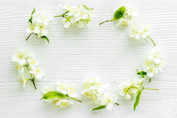 Top view of blossom jasmine flowers. Floral pattern flat lay