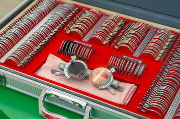 Optics store clinic. A set of lenses for the selection of glasses for the patient