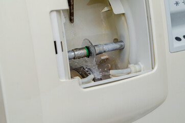 Machine for turning lenses of glasses. Final treatment of the lens on grinding wheel