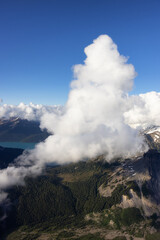 Aerial View from Airplane of Canadian Mountain Landscape. Sunny Summer Cloudy Day. Garibaldi between Squamish and Whistler, North of Vancouver, BC, Canada.