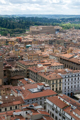 Fototapeta na wymiar Red rooftops of Florence with the Palazzo Pitti