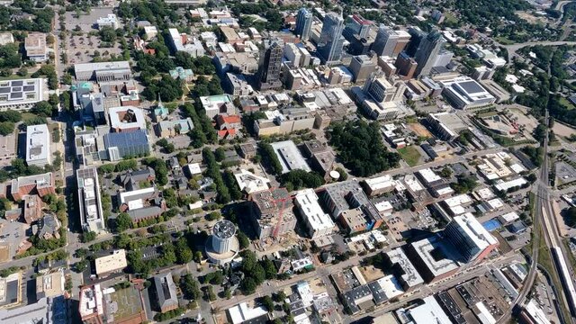 City bird eye view of residential district and financial buildings on sunny day in Raleigh, North Carolina, USA