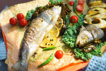 Fototapeta na wymiar grilled fish with vegetables ready to eat. Food art. Healthy lifestyle. Restaurant menu. 
