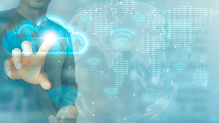 Businessman on blurred background using flying network connection interface, a global network on planet earth blue background technology internet concept.
