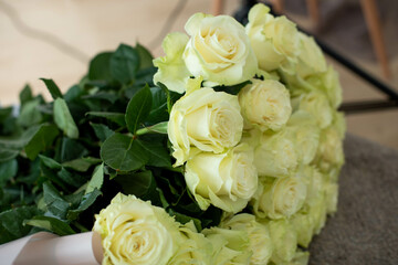 bouquets of mixed flowers the work of the florist at a flower shop. Delicate Pastel color. Fresh cut flower. Green and pink color