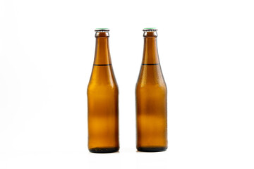 beer bottle on a white background,Bottle of beer with drops isolated on white background