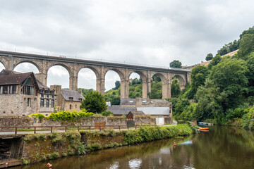 Fototapeta premium Houses and boats on the Rance river in Dinan medieval village in French Brittany, France