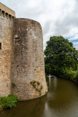 Fototapeta na wymiar Castle walls of the Hunaudaye is a medieval fortress, French Brittany. Historical Monument of France