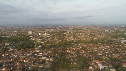 aerial view Yogyakarta with buildings and houses at sunset. urban environment in asia city skyline . cityscape cultural capital Indonesia yogyakarta located on java island, Indonesia