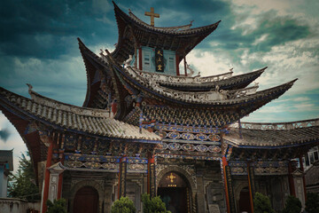 Dali, China, 09-02-2013. 
Old temple against dramatic sky in Dali, in the Yunnan Province, China