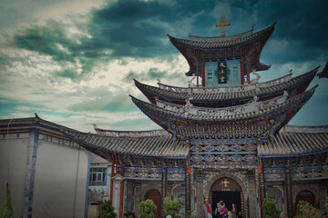 Dali, China, 09-02-2013. 
Old temple against dramatic sky in Dali, in the Yunnan Province, China