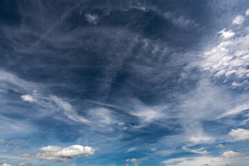 Summer Blue Sky and white cloud white background. Beautiful clear cloudy in sunlight calm season. 