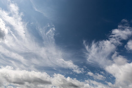 Summer Blue Sky and white cloud white background. Beautiful clear cloudy in sunlight calm season. 