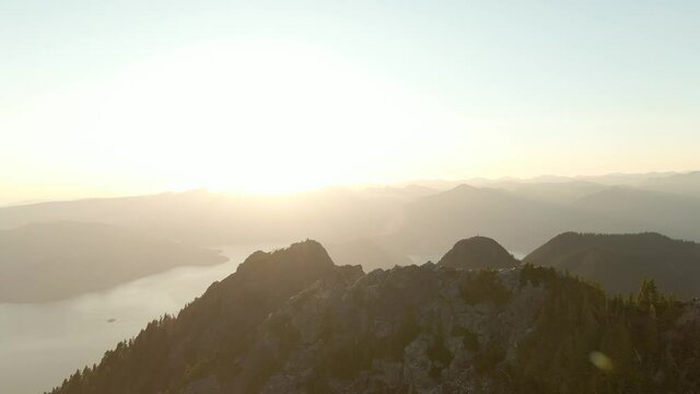 Aerial View of Rocky Canadian Mountain Landscape. Sunny Summer Evening. Sight from Mnt Brunswick, near Vancouver and Squamish, British Columbia, Canada.