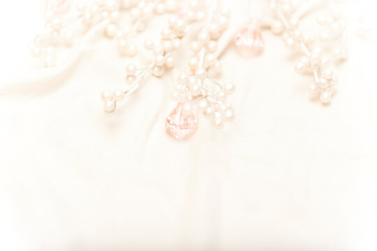 White Pearls And Pink Jewels Nestled In White Silk