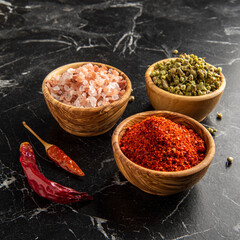 spice bowls on marble table in the kitchen