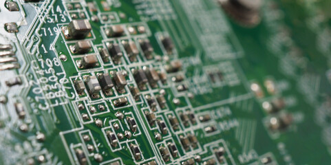 Semiconductor. cpu chip located on the green motherboard of the computer. Semi conductor motherboard circuit board. Hightech computer board with manufacture chip pcb technology. Smart phone iot chip.