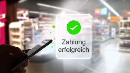 Bestätigung einer Zahlung mittels eines Online-Bezahldienstes und einem Smartphone im Supermarkt,...
