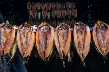 kippers hanging in a smoking house