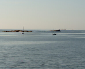 Sailing boats near rocky islands in Baltic sea, near Hanko, Finland