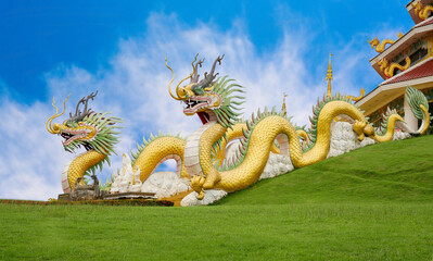Golden yellow Chinese dragon at Huai Pla Kung Temple, a bublic Chinese temple in Chiang Rai...