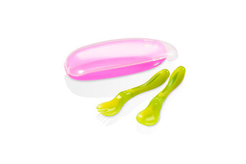 Set of pink portable utensil container with green fork and spoon isolated