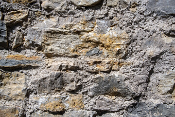 Natural stone wall as texture or background