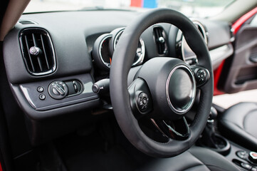 Steering wheel of city car. Small car for cities.