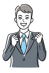 ガッツポーズをする若いビジネスマン